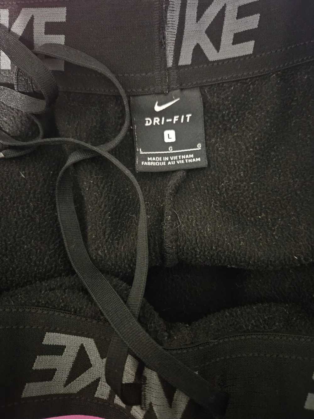 Nike Men’s Black Jogger Sweatpants with Silver Swoosh